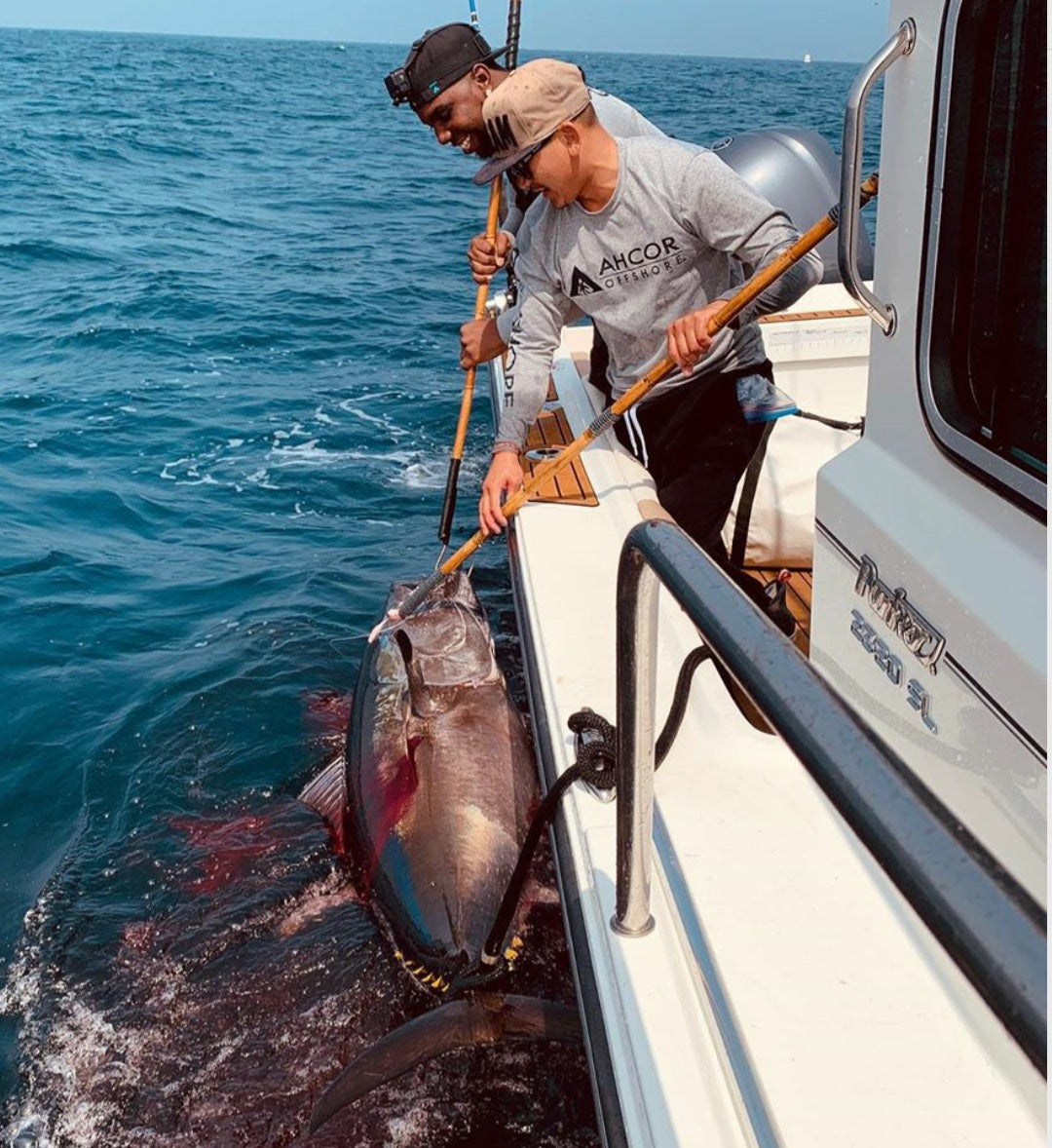 Parker 2320 boat wearing Ahcor Offshore Clothing.